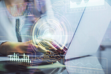 Multi exposure of woman hands working on computer and data theme hologram drawing. Tech concept.