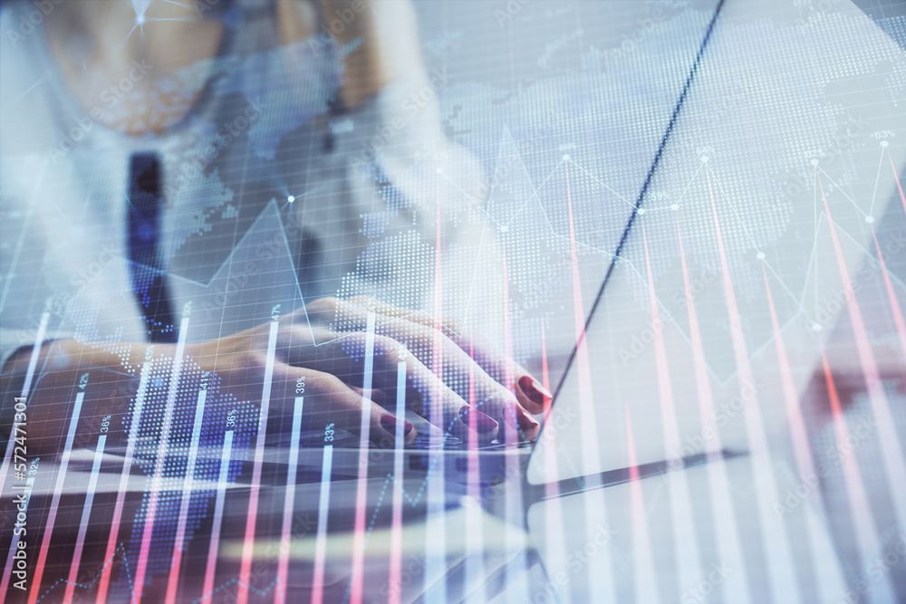 Poster double exposure of woman hands typing on computer and financial graph hologram drawing. stock market
