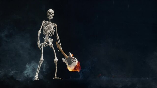 Skeleton smashes a burning rock guitar. Slow motion explosion with fire flames, smoke and sparks.