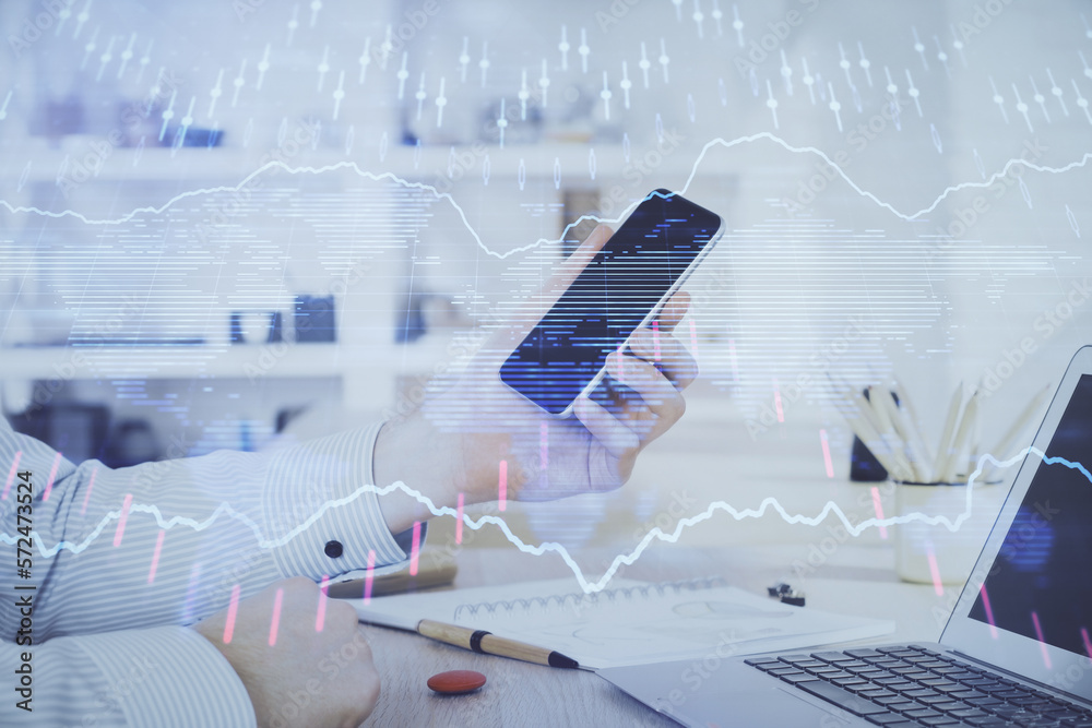 Poster Double exposure of man's hands holding and using a digital device and forex graph drawing. Financial market concept.