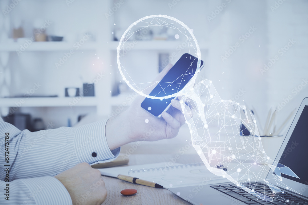 Poster double exposure of man's hands holding and using a mobile device and creative hologram drawing.