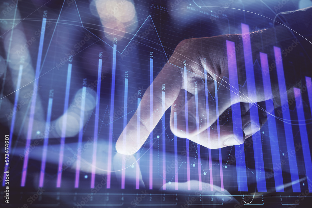Poster multi exposure of man's hands holding and using a phone and financial chart drawing. market analysis