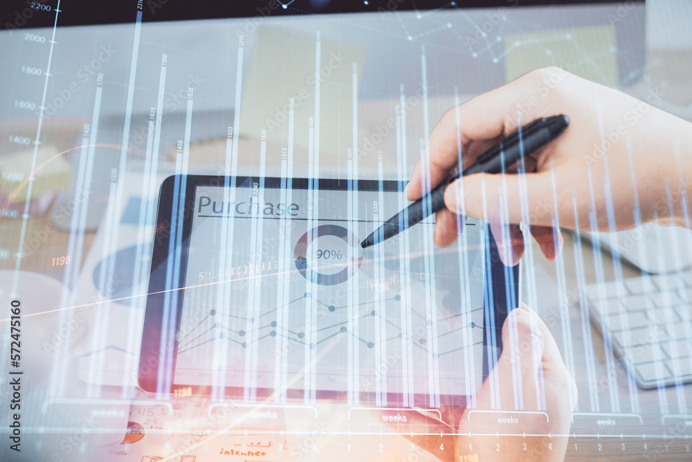 Poster double exposure of man's hands holding and using a phone and financial chart drawing. market analysi
