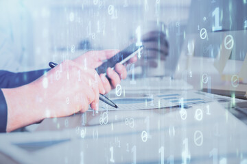 Multi exposure of man's hands holding and using a digital device and data theme drawing. Innovation concept.