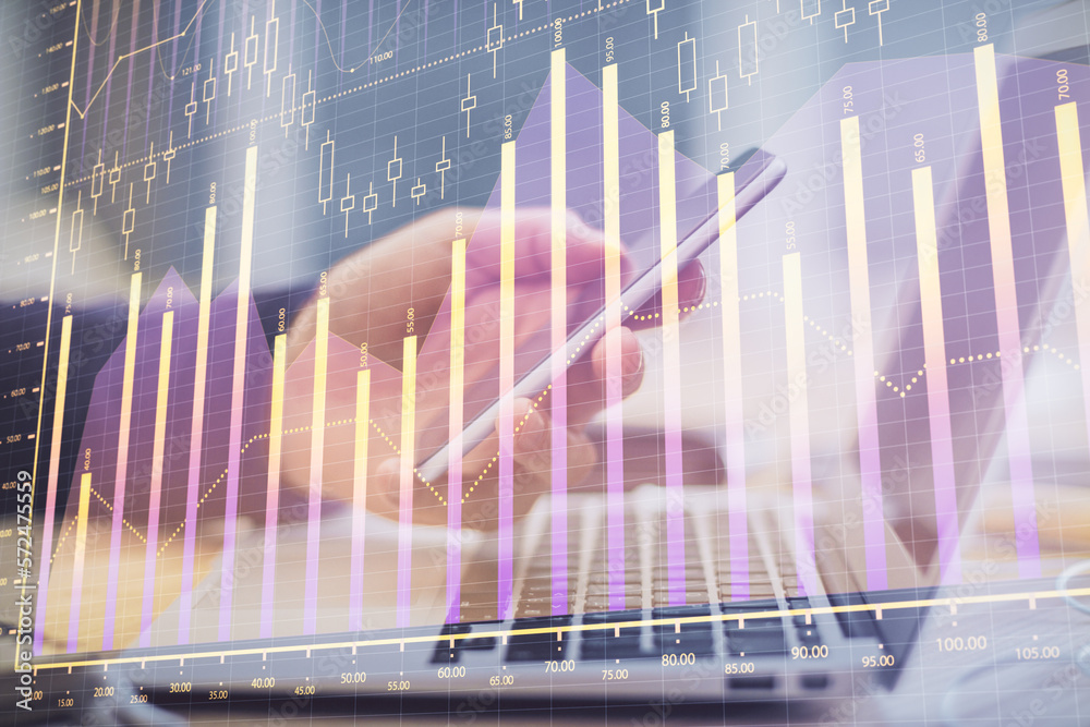 Poster double exposure of man's hands holding and using a phone and financial graph drawing. analysis conce