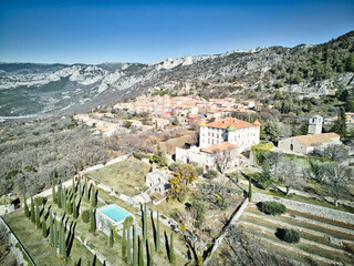 Castle in Aiguines village (Gorges du Verdon) and Sainte-Croix lake in the Provence-Alpes-Côte...