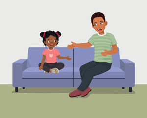 Young African father talking to his daughter sitting on sofa giving advises encouragement and support 