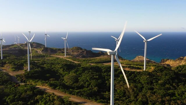 Wind turbines on the coastline. Wind power plant. Philippines.Wind turbines on the coastline. Wind power plant. Philippines.