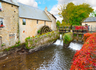 The water mill on the River Aure in the medieval town of Bayeux on the Normandy Coast of France, with bold autumn colors  © Kirk Fisher