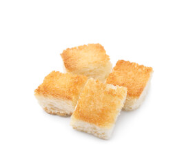 Pile of delicious crispy croutons on white background