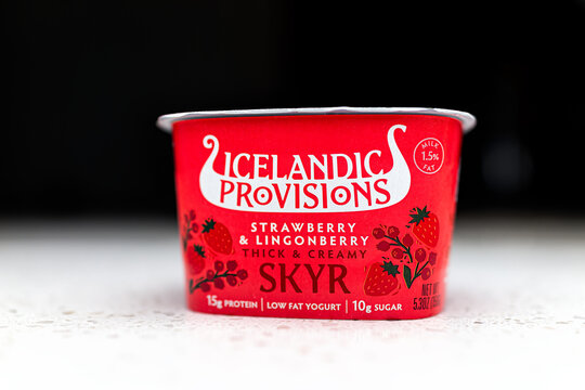 Naples, USA - January 23, 2022: Product label sign for Icelandic Provisions brand of low fat skyr yogurt traditional food in Iceland made with strawberry lingonberry fruit flavor