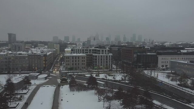 Drone video of warsaw city skyline on a snowy and foggy day4