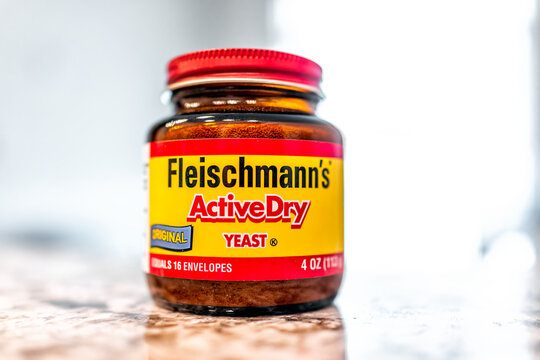 Avon, USA - June 18, 2022: Closeup macro of Fleischmann's Active Dry Yeast glass bottle product for bread rising original formula