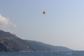 paragliding in the blue sky, paragliders, hang gliders at sky