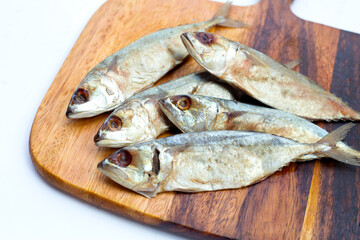 Salted fish on white background.