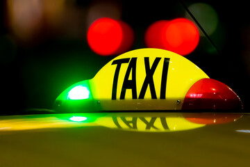 Taxi at night with lights signal system works.