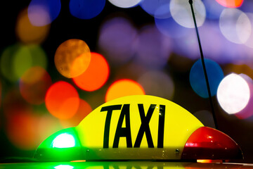 Taxi at night with lights signal system works.