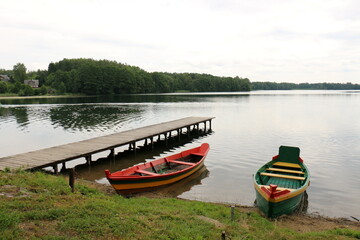 Fototapeta na wymiar Rowing boat on the shore of Lake Naroch.