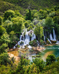 Fototapeta na wymiar Amazing cascades of Kravica Waterfall in Bosnia and Herzegovina