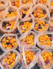 Process of preparing bowls with natural raw pet dog food at home, preparation of healthy raw barf for cats dogs, with duck, turkey, offals, meat, vegetables, assorted fresh portions in containers bags