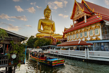 Golden big Buddha head. Big Buddha of Paknam Temple in Bangkok. Religion famous tourist place. - obrazy, fototapety, plakaty