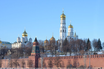 Archangel Cathedral and Peter the great bell tower behind the Kremlin wall