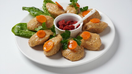 Gefilte fish with carrots, lettuce, horse radish. Passover traditional Jewish food - celebration...