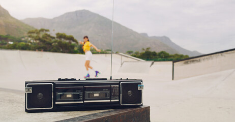 Music, park and woman rollerskating with a stereo for fitness, training and learning in Norway. Freedom, practice and girl skating for exercise with a radio for motivation, fun and skate cardio