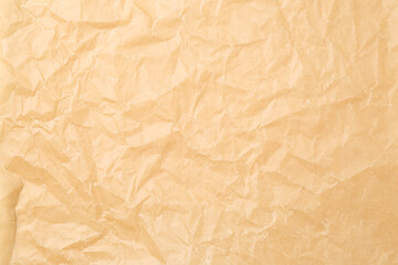 Crumpled sheet of baking paper as background, closeup