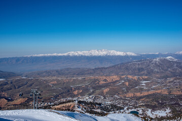 View from Chimgan mountains of the western Tien Shan. Sunny landscape. Mountains os Asia. Ski tourism in Uzbekistan