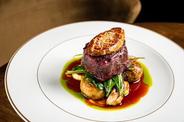 ribeye steak with potato and meat sauce