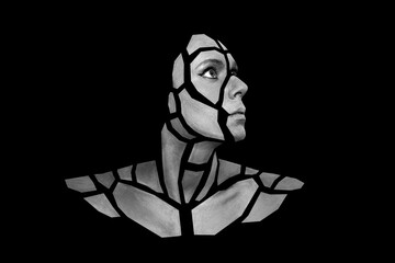Portrait of person with art creative grey makeup posing in the studio. Shape of gray polygons on...