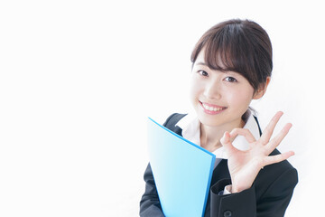 Fototapeta premium OKを示すビジネスウーマン