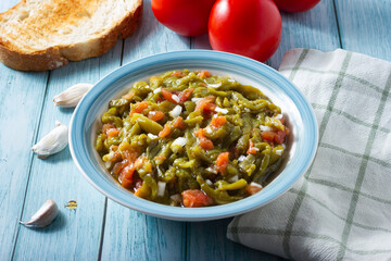 Vegan salad of roasted peppers and tomatoes with onion. Healthy food.