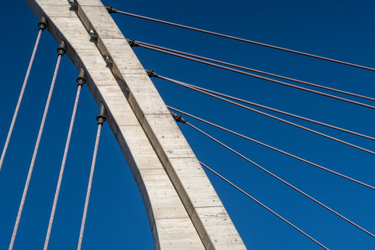Concrete mast and support cables of the Pretil Pedestrian Footbridge, Bernesga River, Le&oacute;n, Spain.