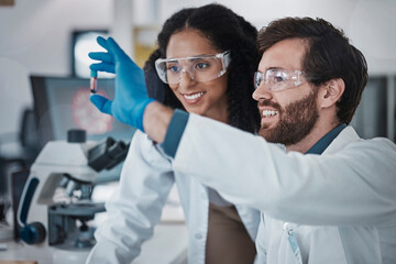 Teamwork, collaboration or blood test tube in laboratory research success, dna engineering innovation or medical vaccine. Smile, happy man or black woman with scientist sample for pharmacy medicine