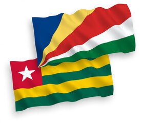 Flags of Togolese Republic and Seychelles on a white background