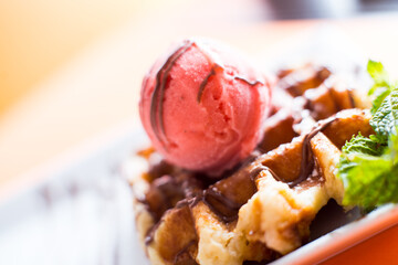 A waffle, also cited with the foreign words waffle, wafol, wafel or waffle, is a typical Belgian...