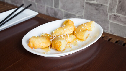 Deep fried vanilla ice cream in an asiatic restaurant.