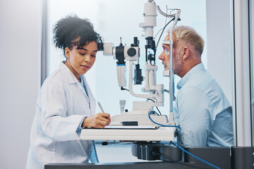 Vision, eye exam and writing with a doctor woman or optometrist testing the eyes of a man patient in a clinic. Hospital, medical or consulting with a female eyesight specialist and senior male - Powered by Adobe