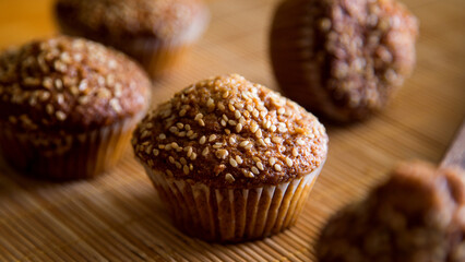 Whole wheat muffins with whole wheat flour and sesame.