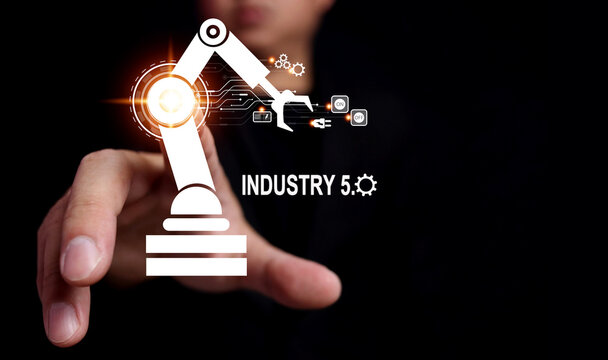 business man touching an automatic robotic arm with his finger Mechanical simulation augmented reality in the industry, smart factory, industry 5.0 concept.