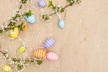Easter decorative composition with painted eggs, flowering branches.