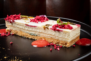 cake with raspberries and sauce