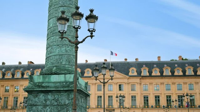 View of The Vendome Place in Paris downtown, France. Vendome Column with old classic buildings on the background, cloudy sky
