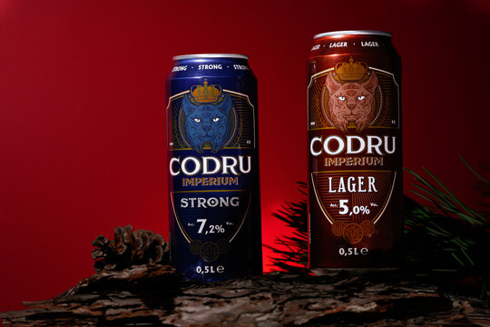 Bucharest, Romania February 2023. Codru is a Romanian beer, both lager and strong, is a beer brand with different flavors. Red background for editorial concept.