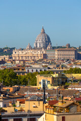Fototapeta na wymiar Aerial view of the city with Saint Peter's Basilica in Vatican City in the distance, Rome, Italy