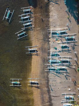 Aerial view of outrigger boats on beach, Amed, Bali, Indonesia