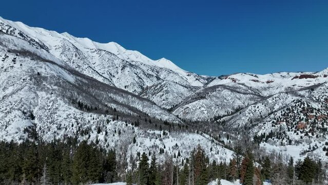 Aerial mountain canyon forest winter snow. Nebo Scenic Byway, Utah, national drive for beauty and nature. Beautiful season winter snow on Wasatch mountain forest. Travel destination. Alpine wil