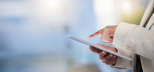 Hands, tablet and planning strategy for digital marketing, advertising or social media against blurred background. Hand of employee manager holding touchscreen for online browsing or plan on mockup